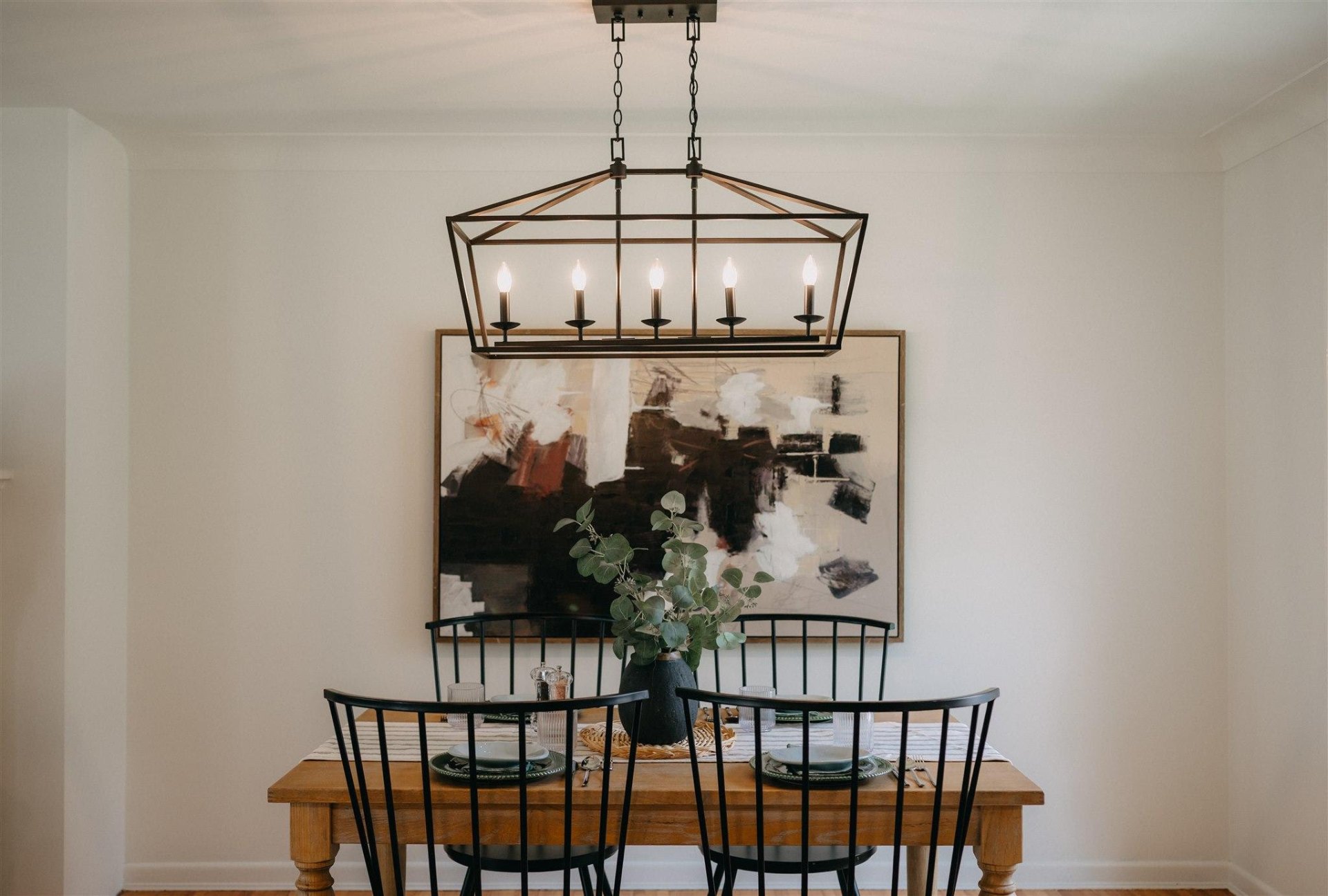 Dining room with statement light fixture at 1115 Jarvis Avenue