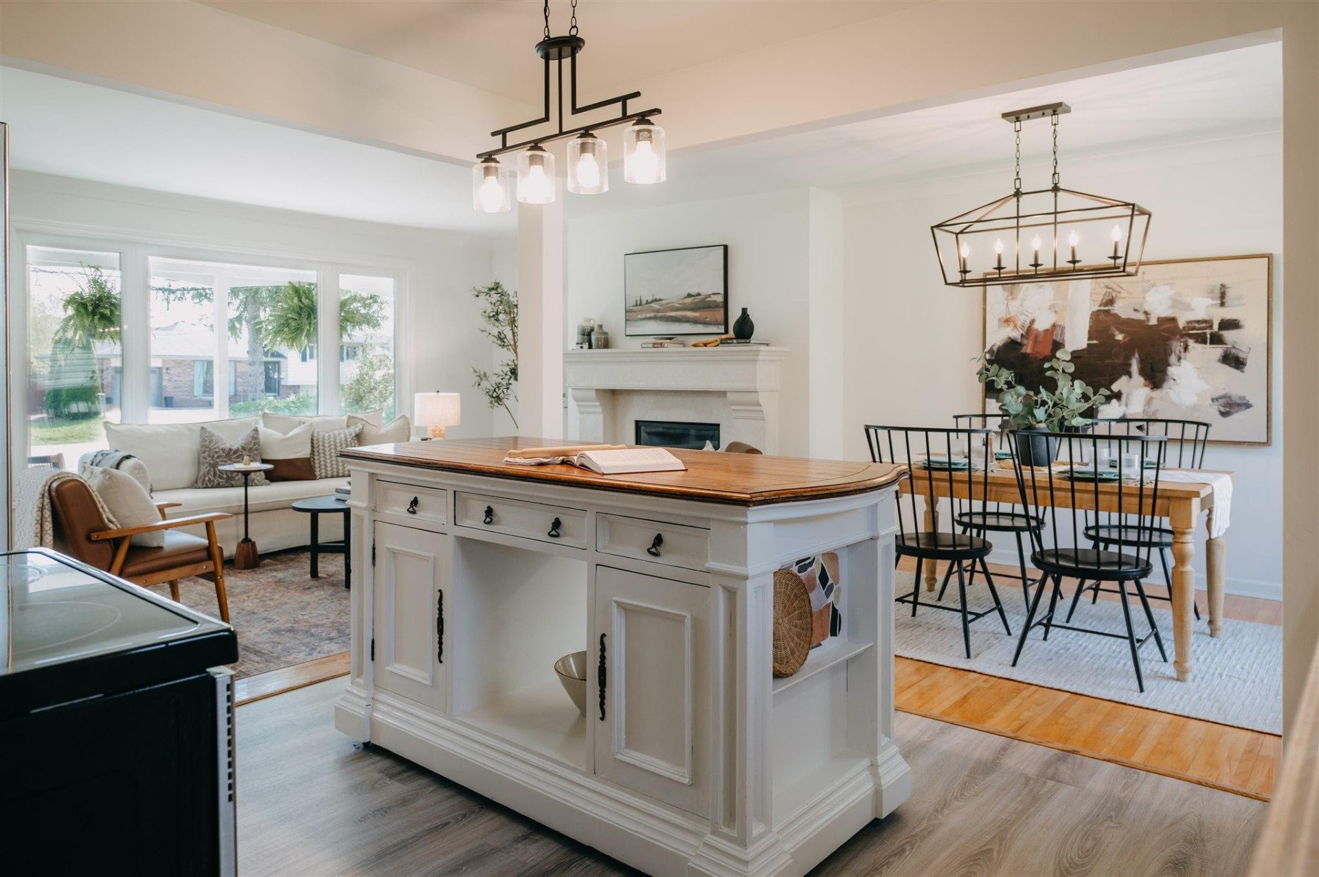 Kitchen island opening to living and dining areas at 1115 Jarvis Avenue